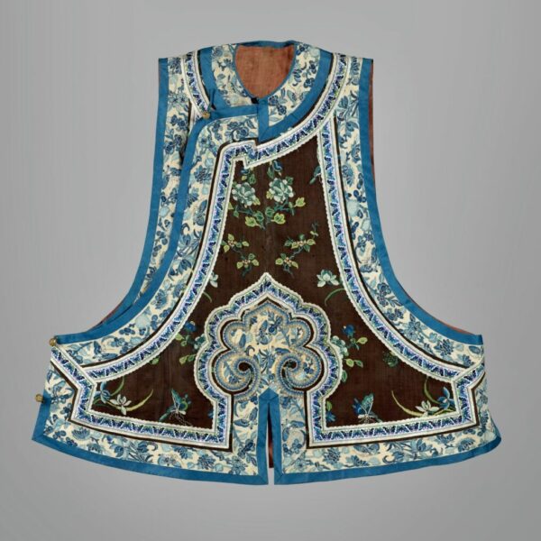 An embroidered sleeveless jacket